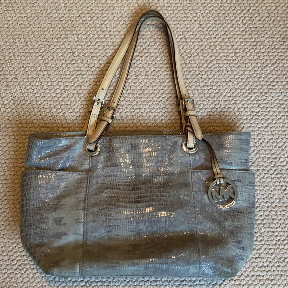 Gentle used Micheal Kor’s bag leather snakeskin